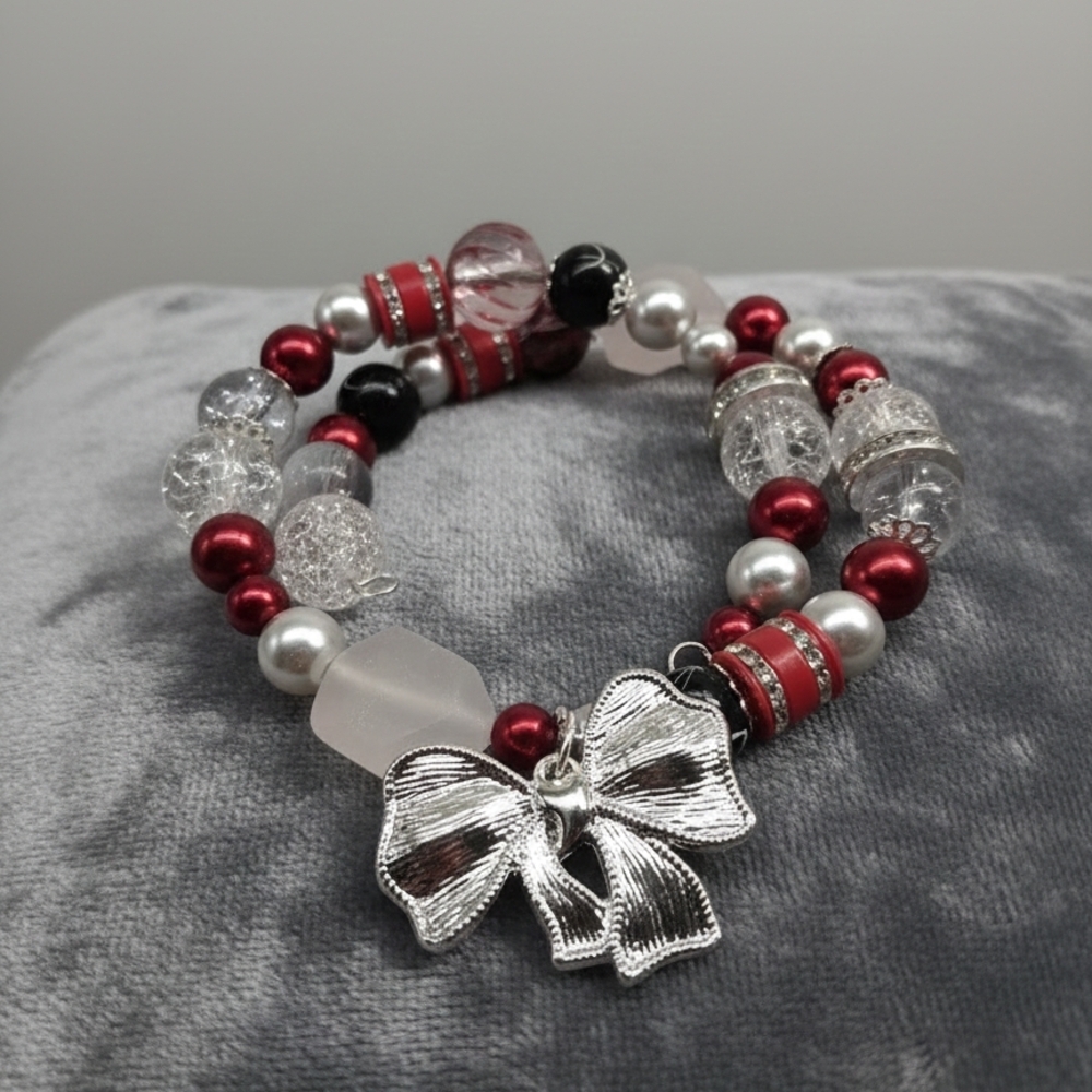Elegant Silver and Red Beaded Bracelet with Bow Charm